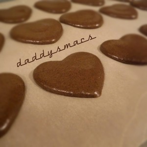 Chocolate heart-shaped macaron